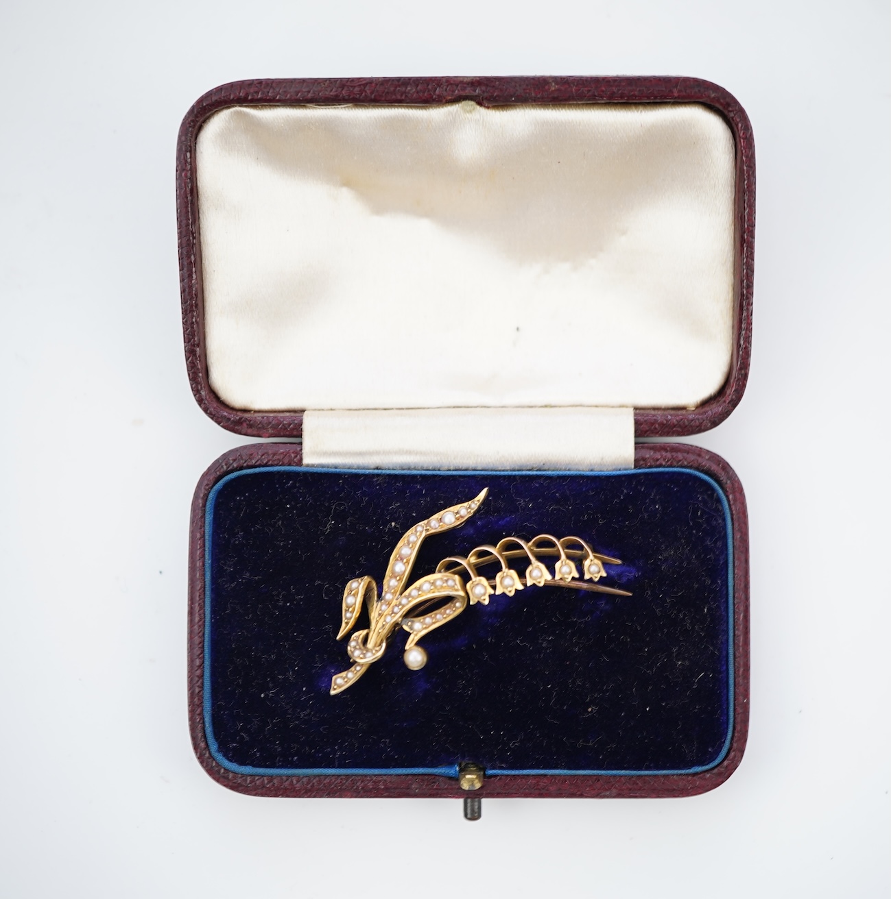 An Edwardian gold and seed pearl brooch, early 20th century